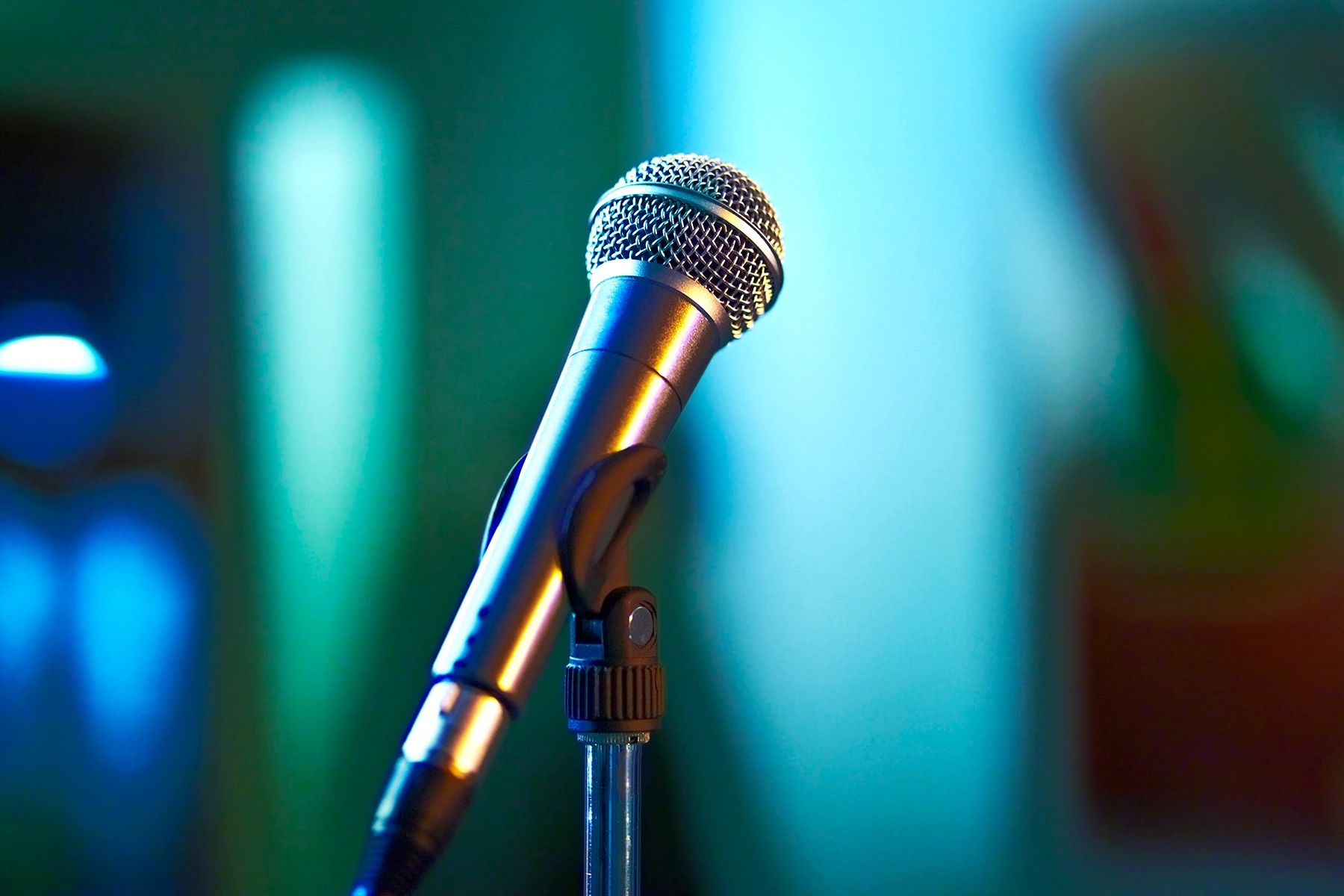 Microphone on stage with warm lighting
